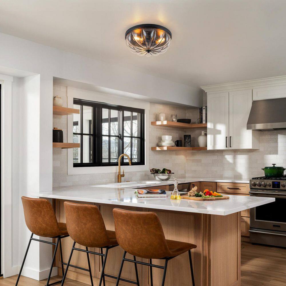 Matera 15.75 in. 3-Light Matte Black Industrial Drum Flush Mount Ceiling Light with Seeded Glass Shade price history on PriceWatchPro