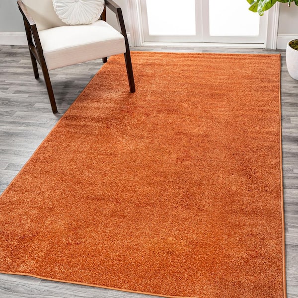 JONATHAN Y Haze Solid Low-Pile Orange 9 ft. x 12 ft. Area Rug