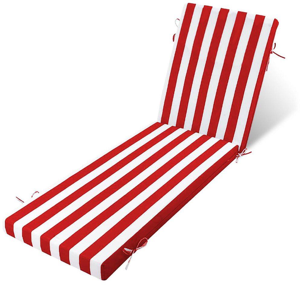 Red and white striped outdoor chaise lounge cushion laid out.
