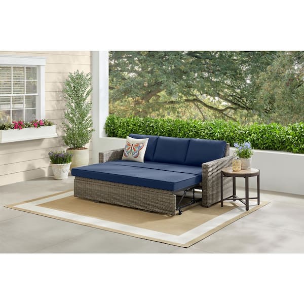 Clarington 1-Piece Wicker Outdoor Convertible Sofa with CushionGuard Navy Cushions