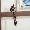DANYA B Man Lifting Woman from Ledge Bronze Sculpture ZD16169