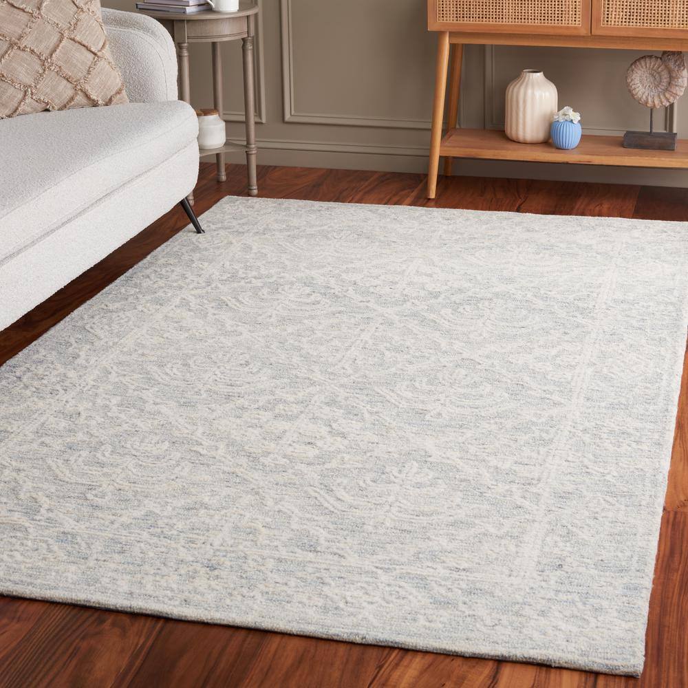 Ivory Hand Tufted Wool 4' x 6' Area Rug