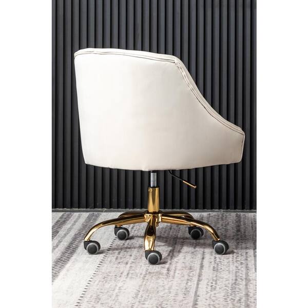 cream office chair with gold legs