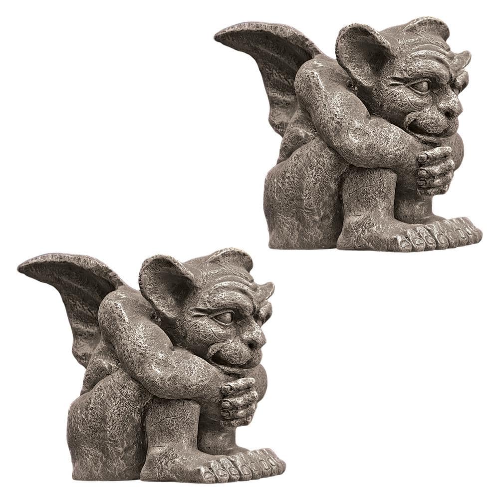 Design Toscano Emmett the Gargoyle Small Sculpture Set (2-Piece) Own a classic. A true purebred, Emmett the Gargoyle boasts lineage as 1 of the original medieval creatures that pensively perched from European rooftop and turret. Our historic, muscular fellow is cast in quality designer resin with an aged and weathered Greystone finish for true authenticity. He is available only at Design Toscano. 1o in. W x 1o in. D x 10.5o in. H, 6 lbs.