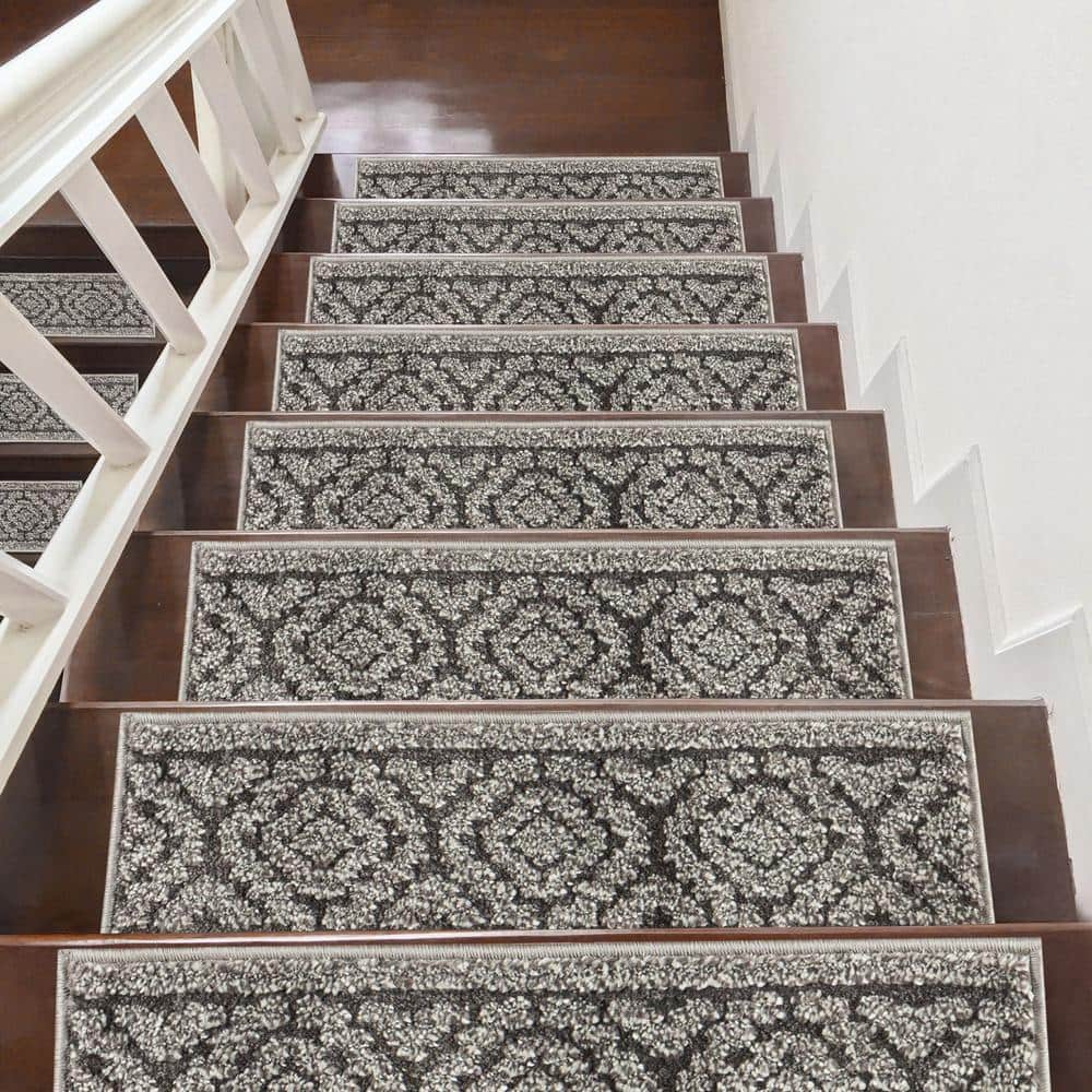 https://images.thdstatic.com/productImages/1678ea54-abfd-4adc-afdf-1b191e5edab5/svn/gray-stair-tread-covers-stair-72a-dg-5-64_1000.jpg