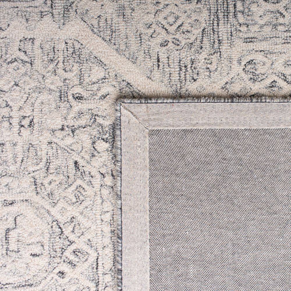 Ivory Elegance 10' x 14' Handmade Wool Tufted Rug