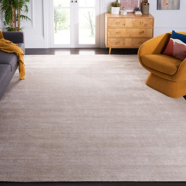 Mirage 8 ft. x 10 ft. Beige Solid Color Distressed Area Rug