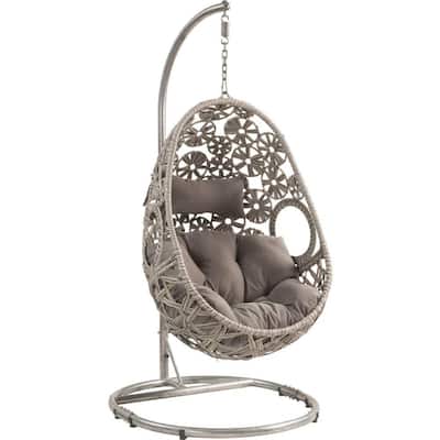 Gray Patio Hanging Chair with Open Circular Motifs and Wicker Frame