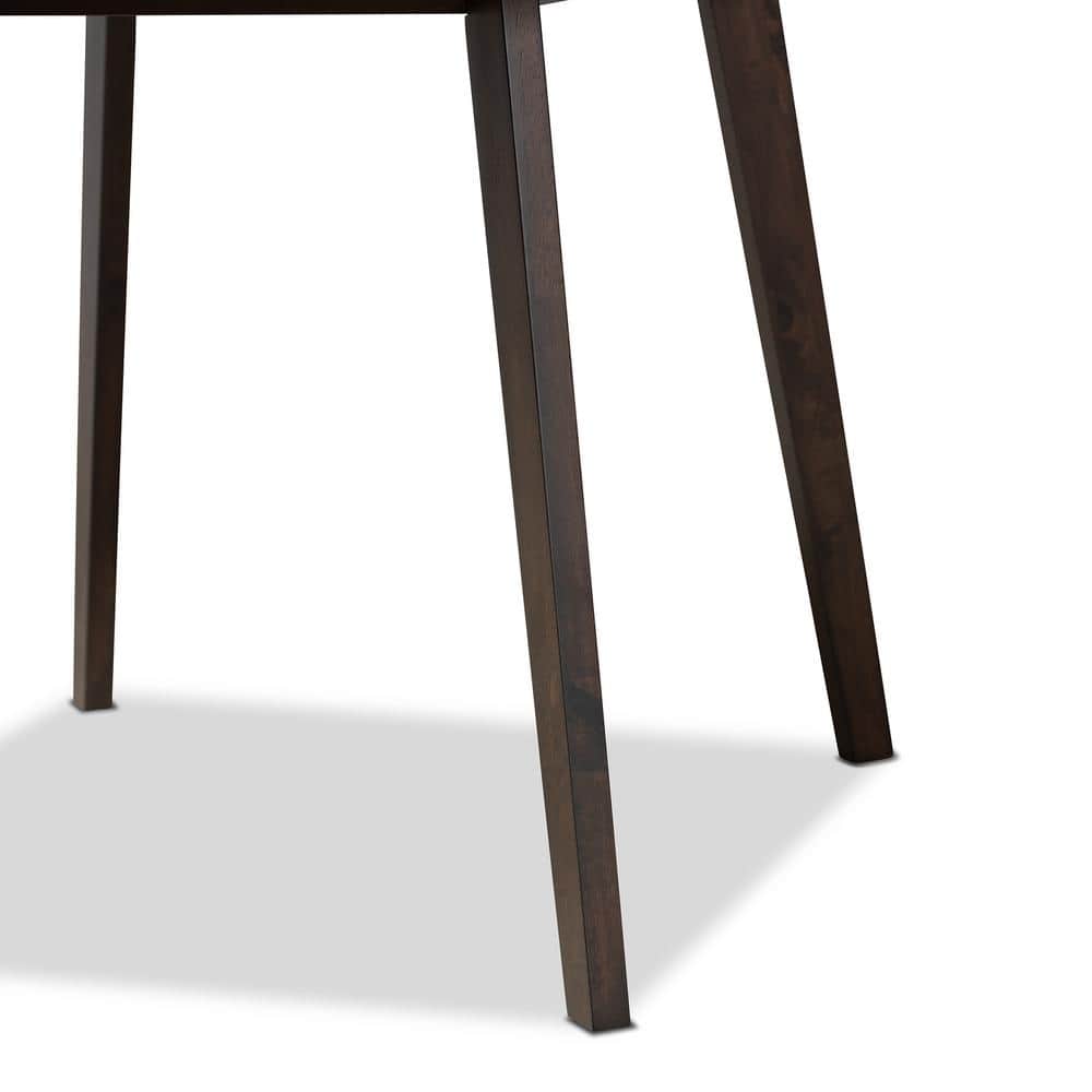 View of dark wood dining chair legs and frame.