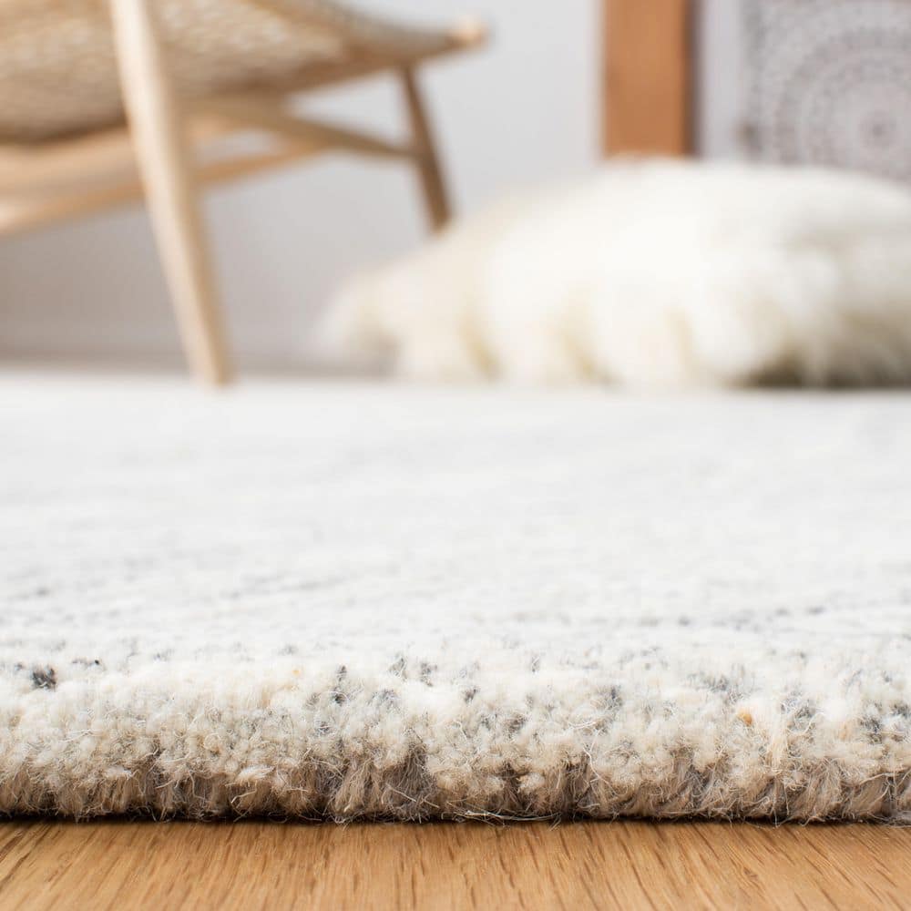 Ivory Elegance 6' x 9' Hand-Tufted Wool Area Rug