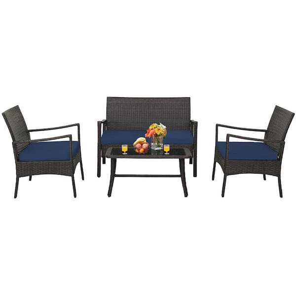Costway 4-Piece Wicker Patio Conversation Set Rattan Furniture Sofa Armrest Coffee Table with Navy Cushions