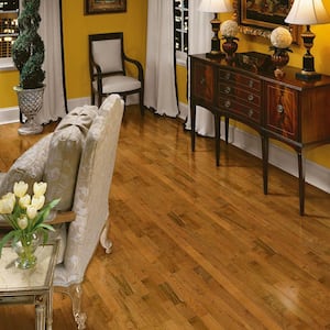 Plano Oak Gunstock 3/4 in. Thick x 2-1/4 in. Wide x Varying Length Solid Hardwood Flooring (20 sq. ft. / case)