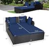 Black wicker day bed with navy blue cushions and dimension measurements.