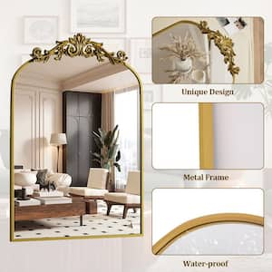 24 in. W x 36 in. H Modern Arched Gold Metal Framed with Carved Decoration Vanity Wall Mirror