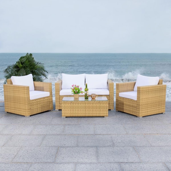 https://images.thdstatic.com/productImages/16e77568-1694-41b8-a86a-c686b7f85b61/svn/safavieh-patio-conversation-sets-pat7508d-2bx-76_600.jpg