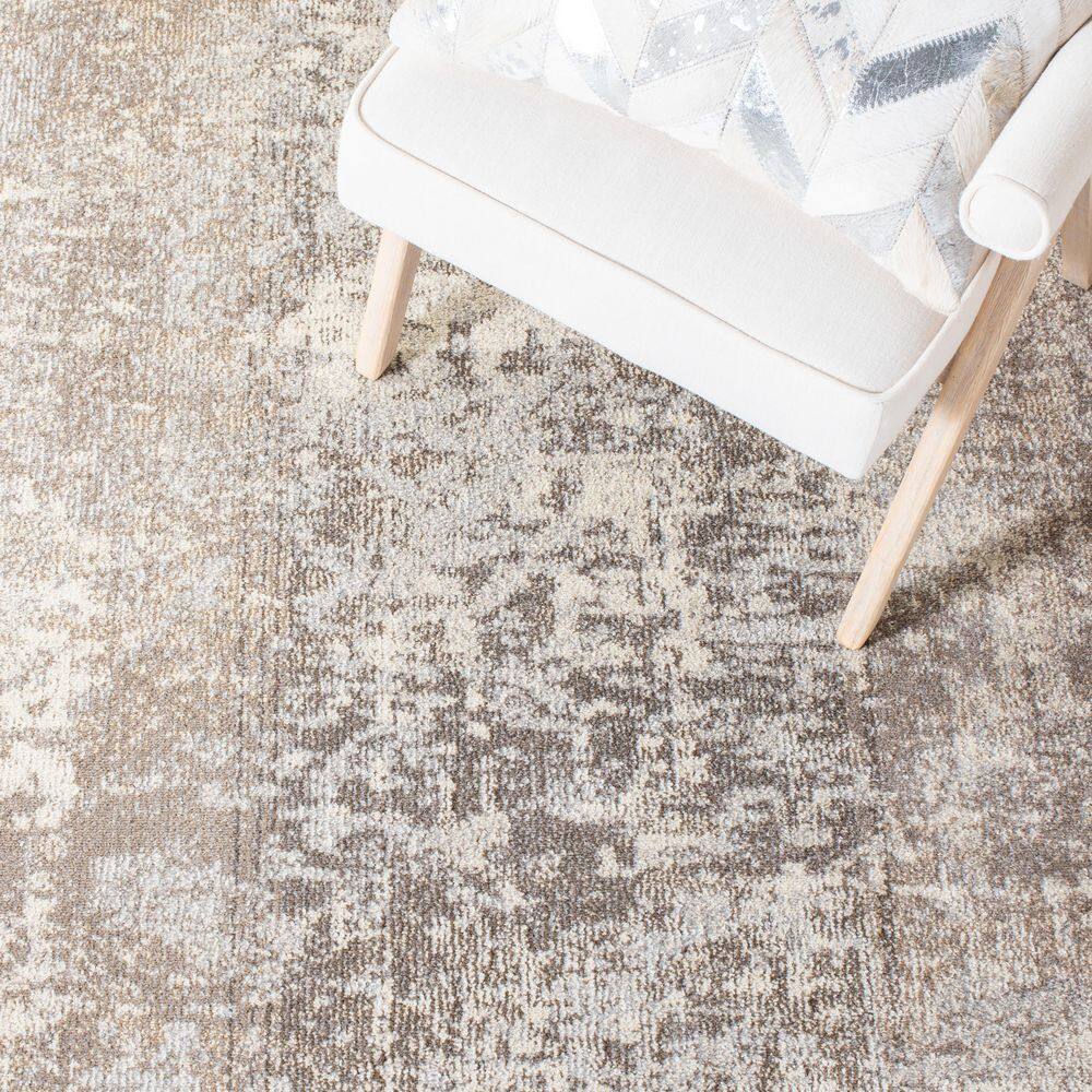 Gray and Beige 10' x 14' Synthetic Flat Woven Reversible Rug