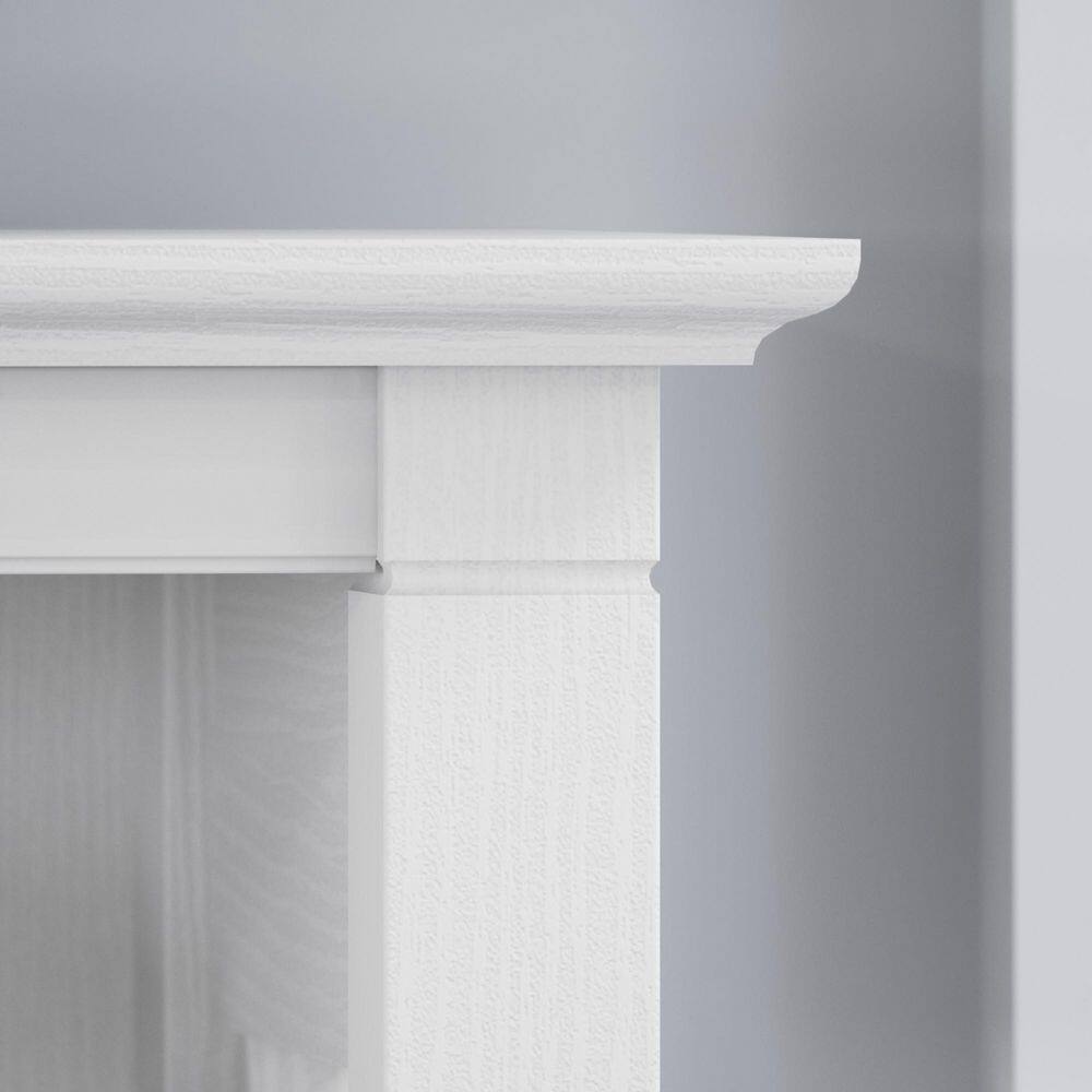 Close-up of the wooden molding detail on the bookcase top.