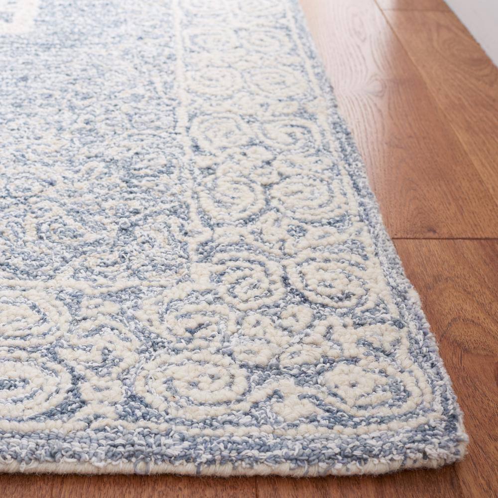 Blue and Ivory Handmade Wool 8' x 10' Abstract Rug