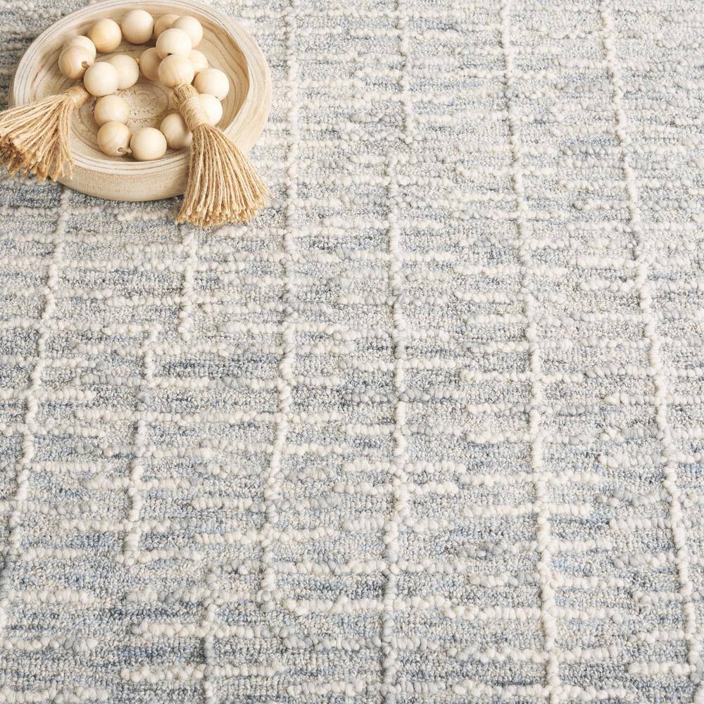 Light Blue 4' x 6' Handmade Wool Tufted Abstract Rug