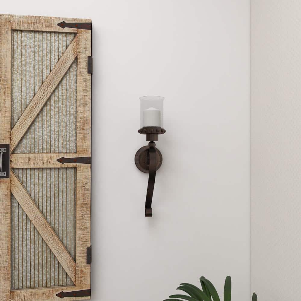 Brown Metal Scroll Wall Sconce with Glass Hurricane