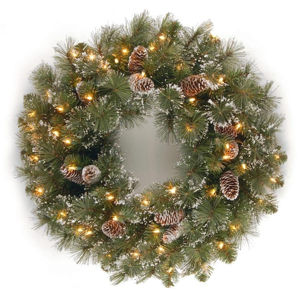 National Tree Company 24 in. Glittery Pine Artificial Wreath with Clear Lights