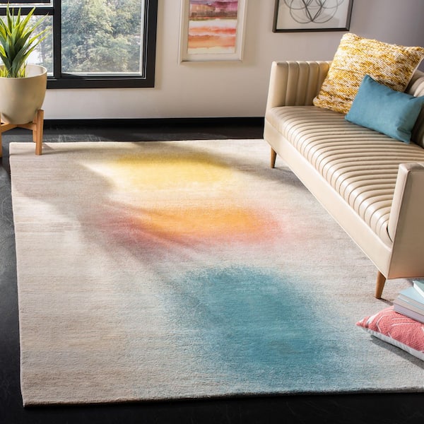 Tibetan 6 ft. x 9 ft. Beige/Gold Abstract Area Rug