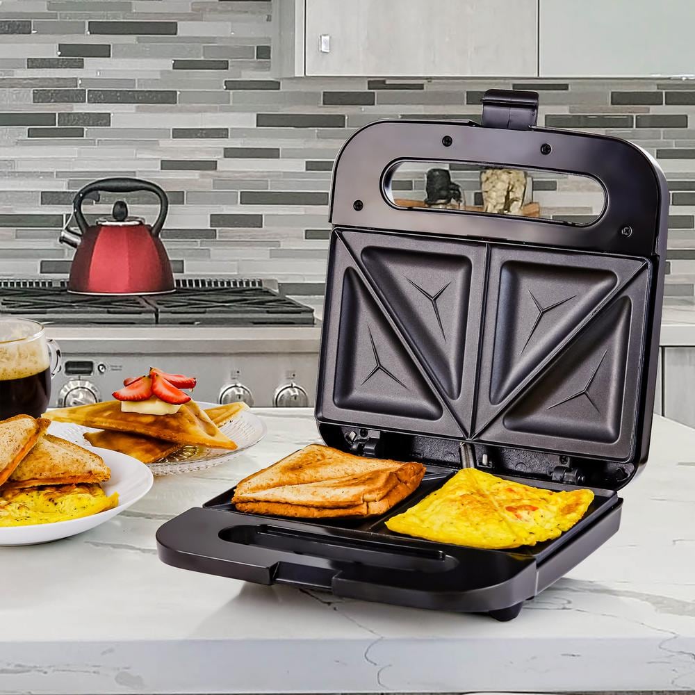 https://images.thdstatic.com/productImages/173e5291-f249-49a7-9e4b-c5aca98e2d13/svn/black-ovente-panini-presses-gps401b-e1_1000.jpg