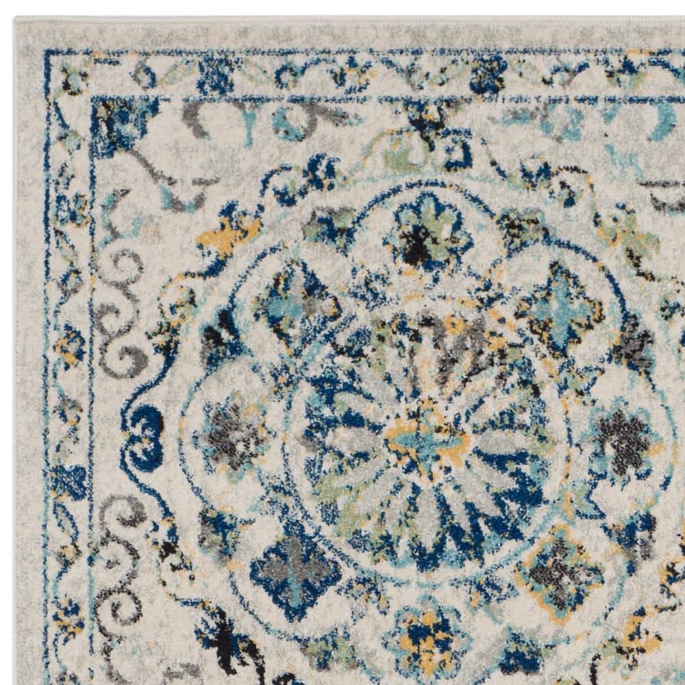 Ivory and Blue Synthetic Rectangular Area Rug, 5'3" x 7'6"
