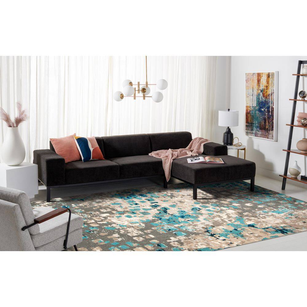 Boho-Chic Gray Geometric Synthetic 10' x 14' Area Rug
