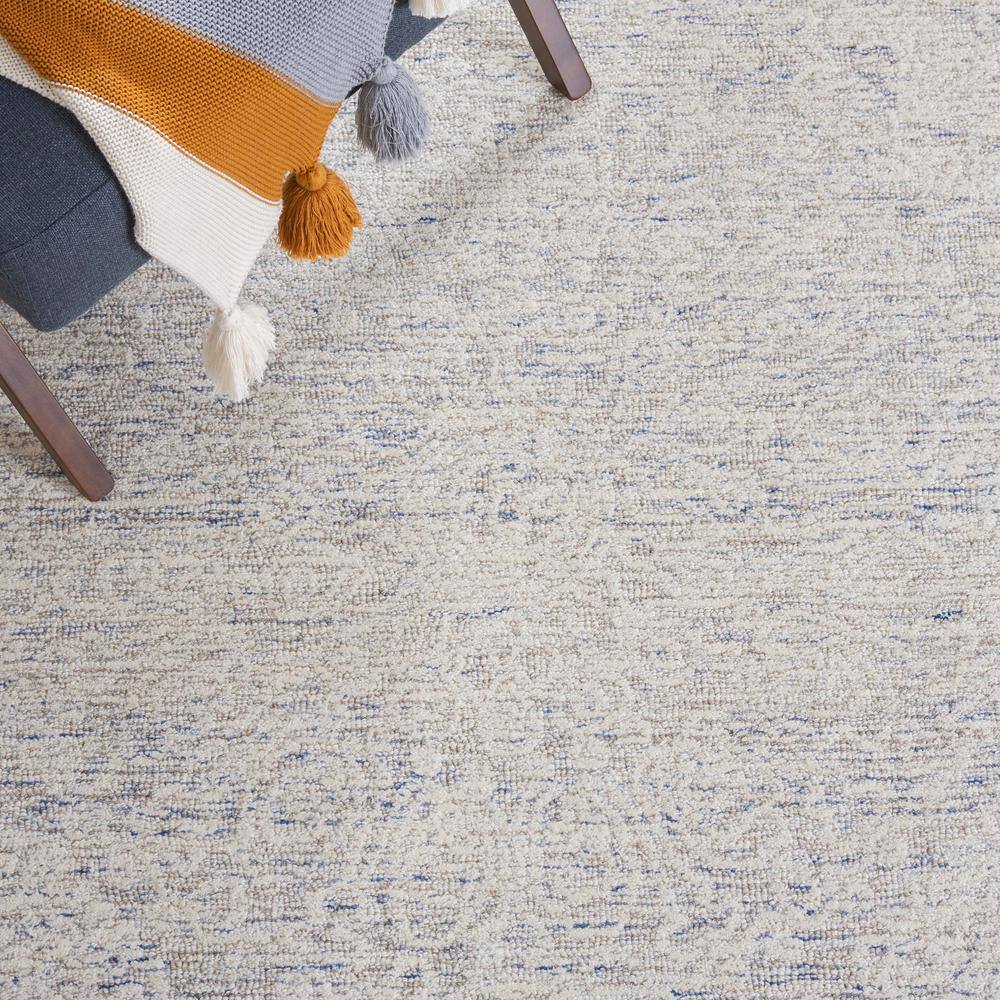 Ivory and Light Blue Floral Wool 8' x 10' Hand-Tufted Rug