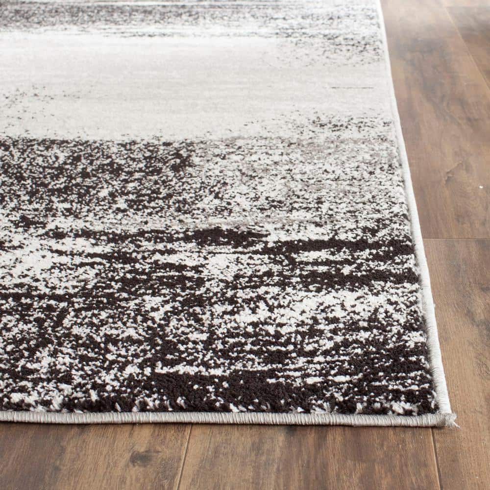 Silver and Multicolor Abstract Synthetic Area Rug