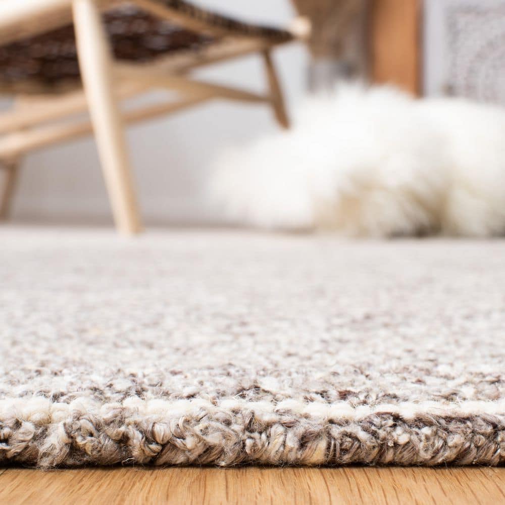Himalaya 9' x 12' Brown Wool and Viscose Tufted Area Rug