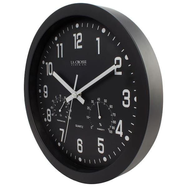 Analogue wall clock with digital thermometer and hygrometer