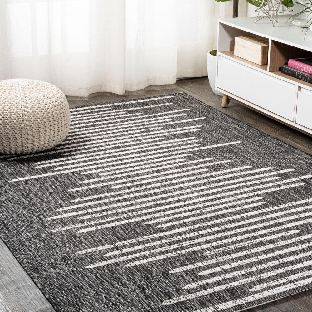 Zolak 4' x 6' Black and Ivory Synthetic Stripe Rug