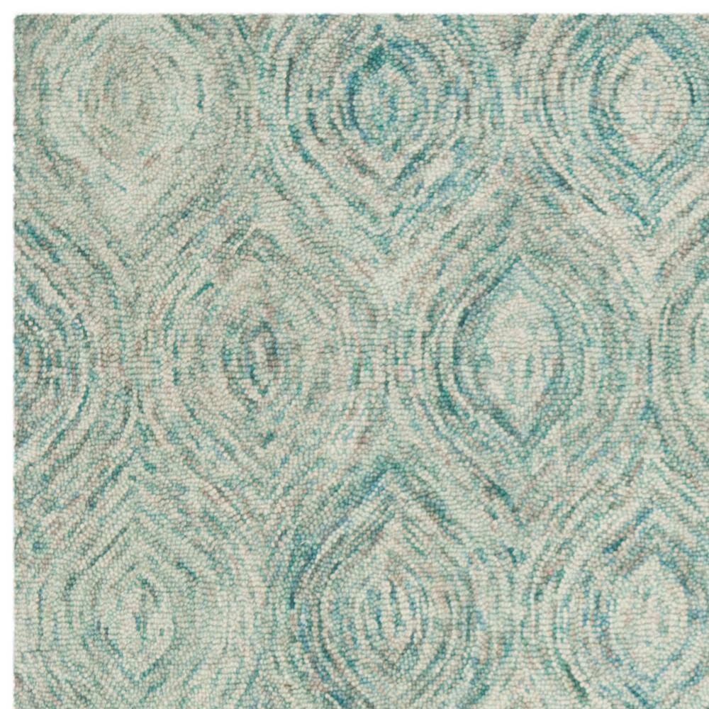 Coastal Breeze Ivory and Sea Blue Hand-Tufted Wool Round Rug