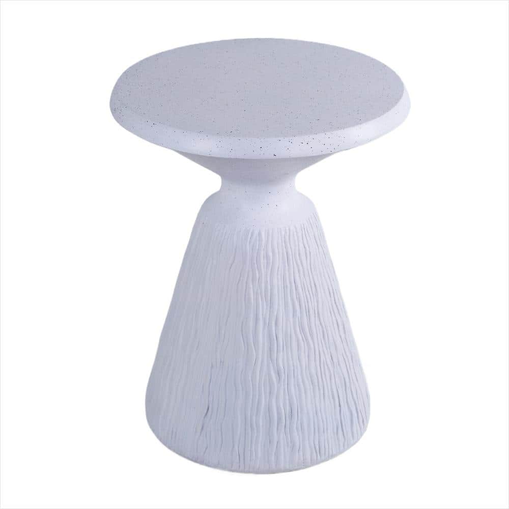 Modern round end table with white speckled top and fluted base.