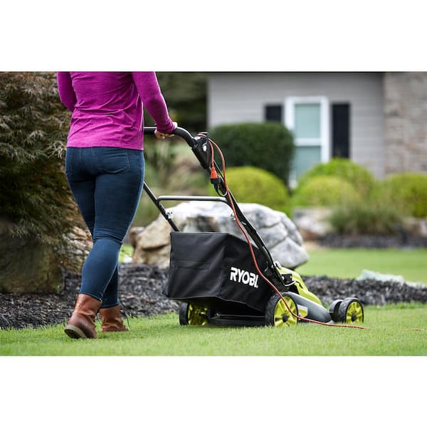 Image of Corded electric narrow lawn mower with mulching attachment