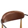 Close-up of the headrest and frame of a dining chair.