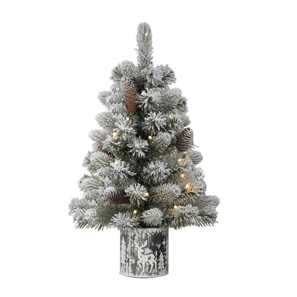 https://images.thdstatic.com/productImages/17fcf5b7-0e83-4c68-941a-7cb8cd8d2853/svn/puleo-international-christmas-tabletop-trees-1833-st20lw035-bo-64_600.jpg