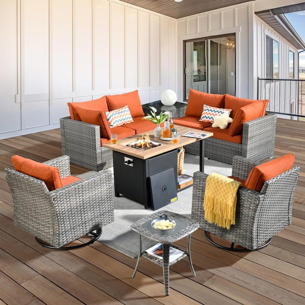 weaxty W Daffodil P Gray 9-Piece Wicker Patio Storage Fire Pit Conversation Set with Swivel Rocking Chair and Orange Red Cushions