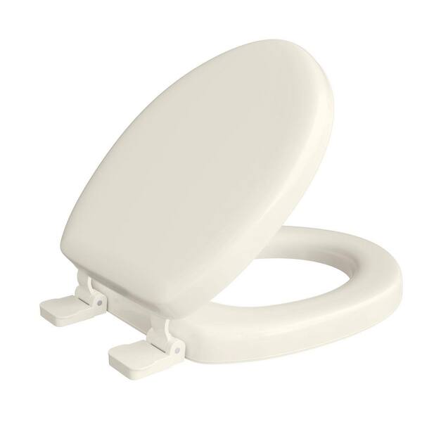 JONES STEPHENS Deluxe Soft Seat with Wood Cores Round Toilet Seat with Cover and Adjustable QuicKlean Hinge in Bone