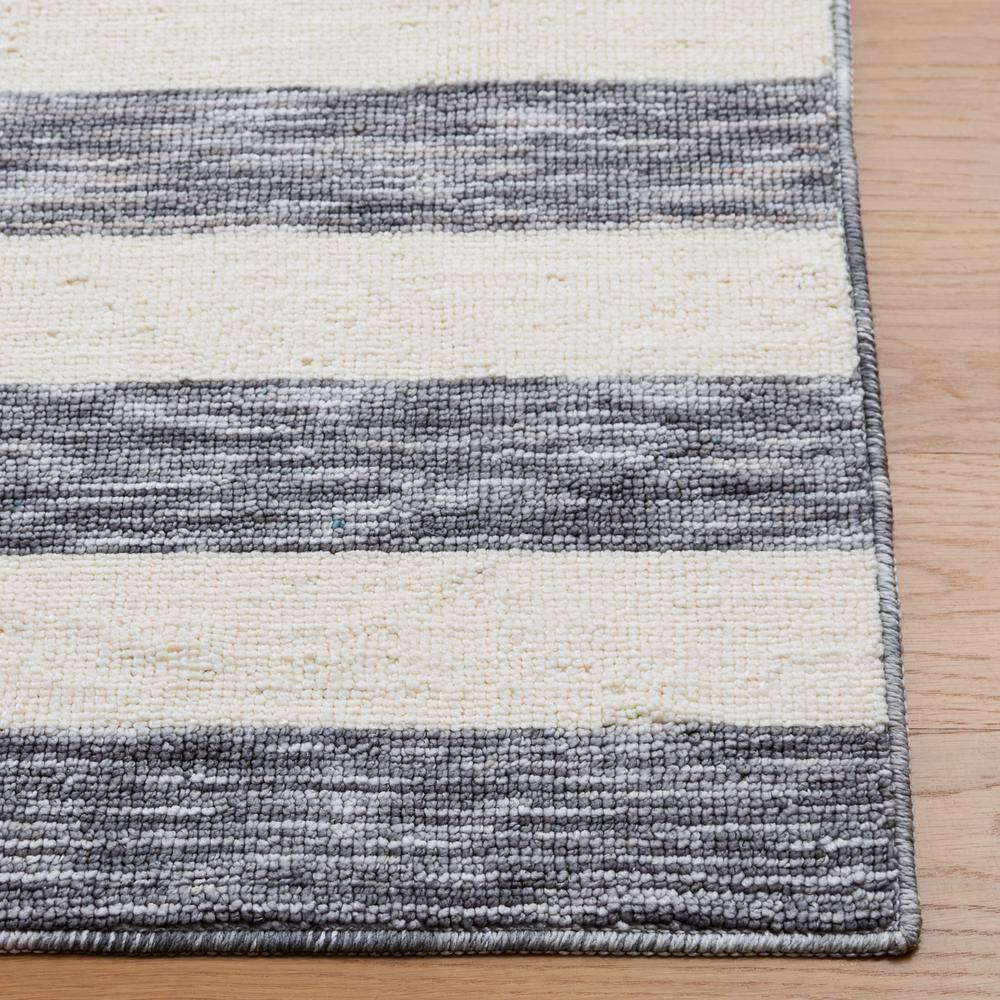 Dark Grey and Ivory Striped 6' x 9' Synthetic Area Rug