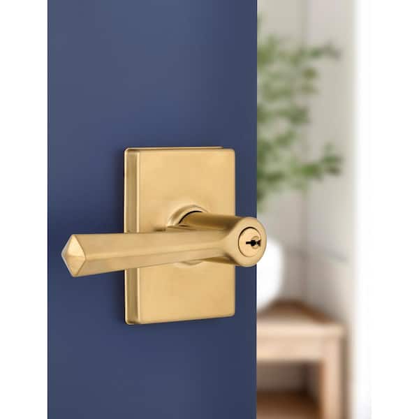 Wilshire Brushed Gold Keyed Entry Door Lever with Rectangle Rose Featuring Dual Keyway