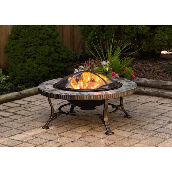 Pleasant Hearth Olivia Slate Top 34 in. W x 19.6 in. H Round Steel Wood Burning Rubbed Gold Fire Pit