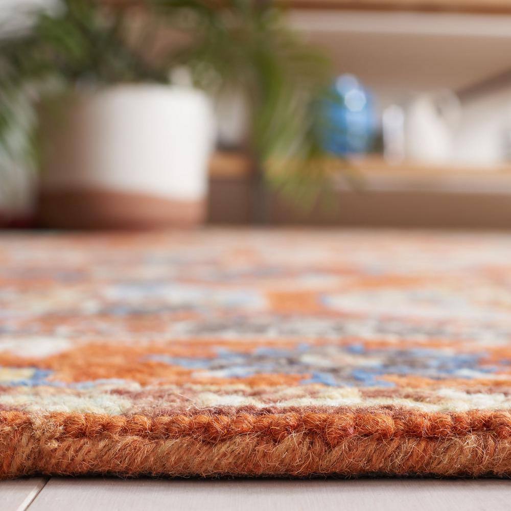 Ivory and Rust Handmade Wool Tufted Rectangular Area Rug 5' x 8'
