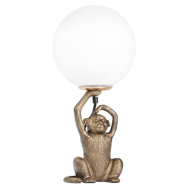 Verne 17 in. Gold Monkey Table Lamp with White Blown Glass Globe Shade