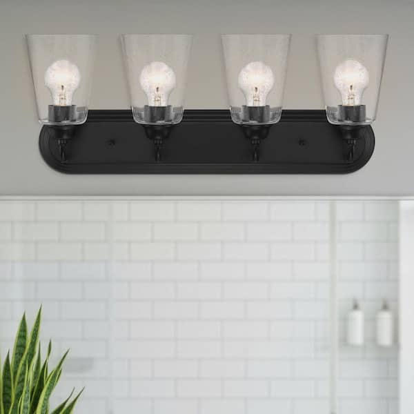 Designers Fountain Zane 26 in. 4-Light Matte Black Industrial Vanity Light with Clear Glass Shades
