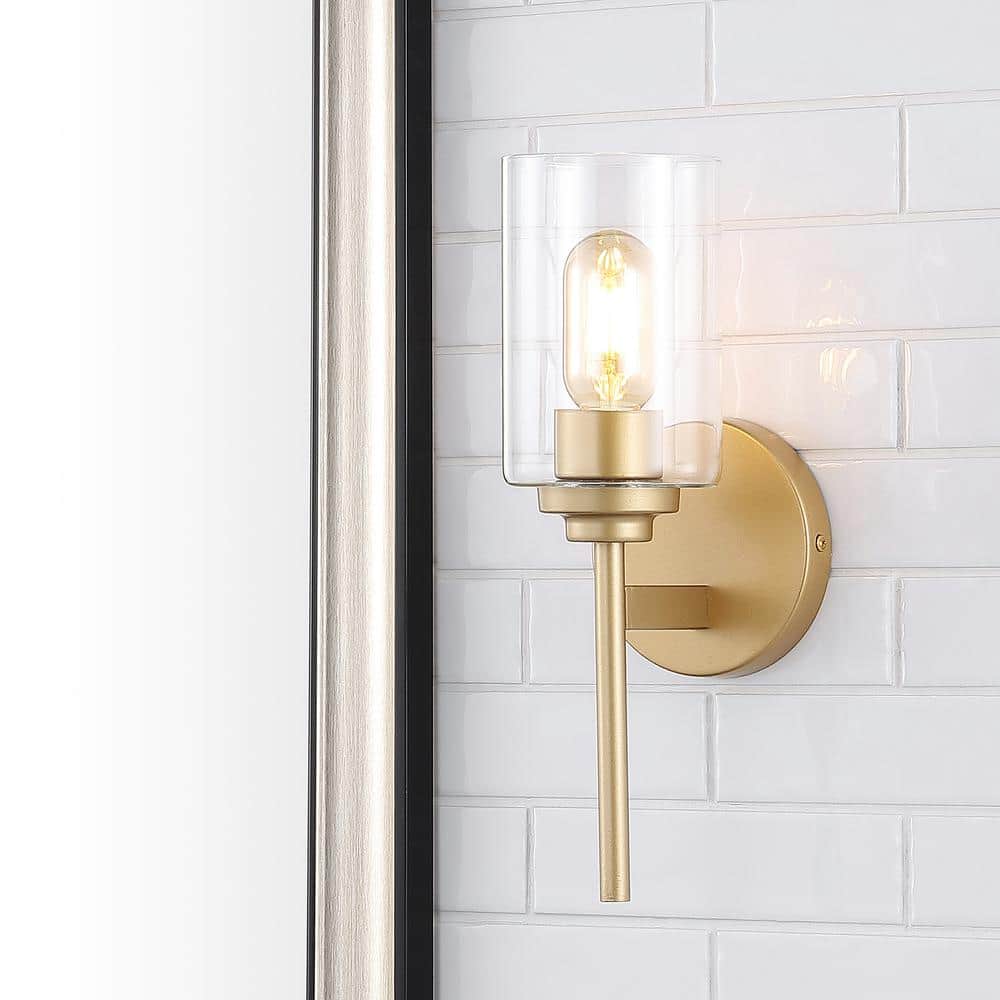 https://images.thdstatic.com/productImages/18572606-12d0-40eb-ba47-e1c89aae9fd1/svn/brass-gold-jonathan-y-wall-sconces-jyl9547b-64_1000.jpg