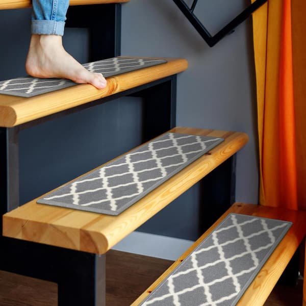 https://images.thdstatic.com/productImages/186ad4c6-9932-4296-945e-539cfa6e316e/svn/gray-trellis-ottomanson-stair-tread-covers-pnk7023-7pk-31_600.jpg