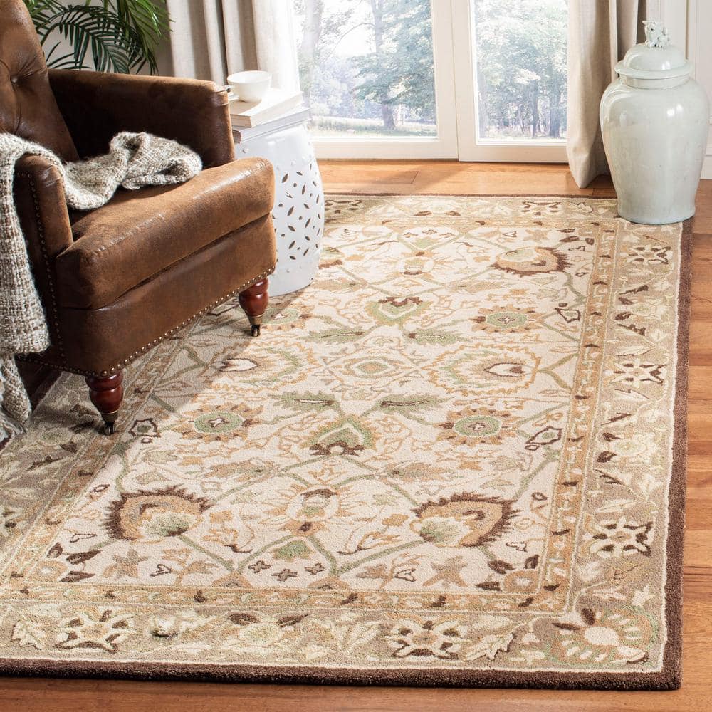 Ivory and Brown 8' x 10' Handmade Wool Floral Rug